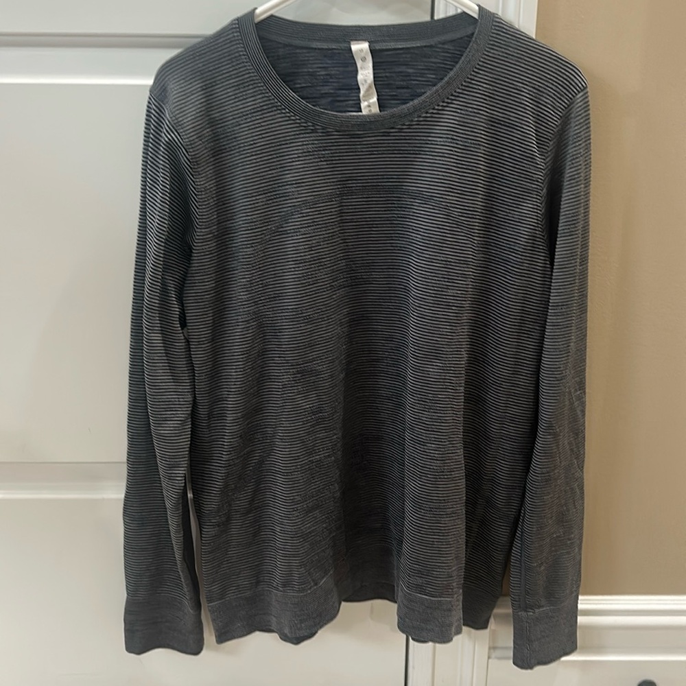 Lululemon Athletica large women’s athletic top.